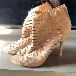 Nude pink heels with zip back and side buckle